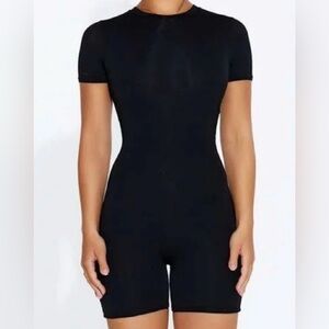 NWOT Naked Wardrobe The Bae-Sic Crew Romper in Black Size 1X